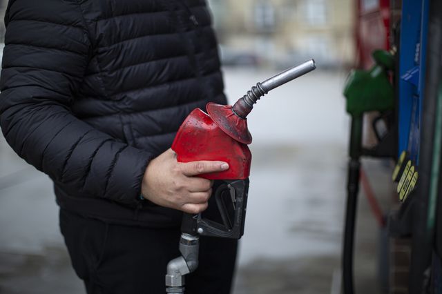 A man at a gas station in Weehawken New Jersey March 9, 2022. Prices finally dipped below $4 at some gas stations in New Jersey this past week, but analysts are cautious about all the factors that could send costs back up.